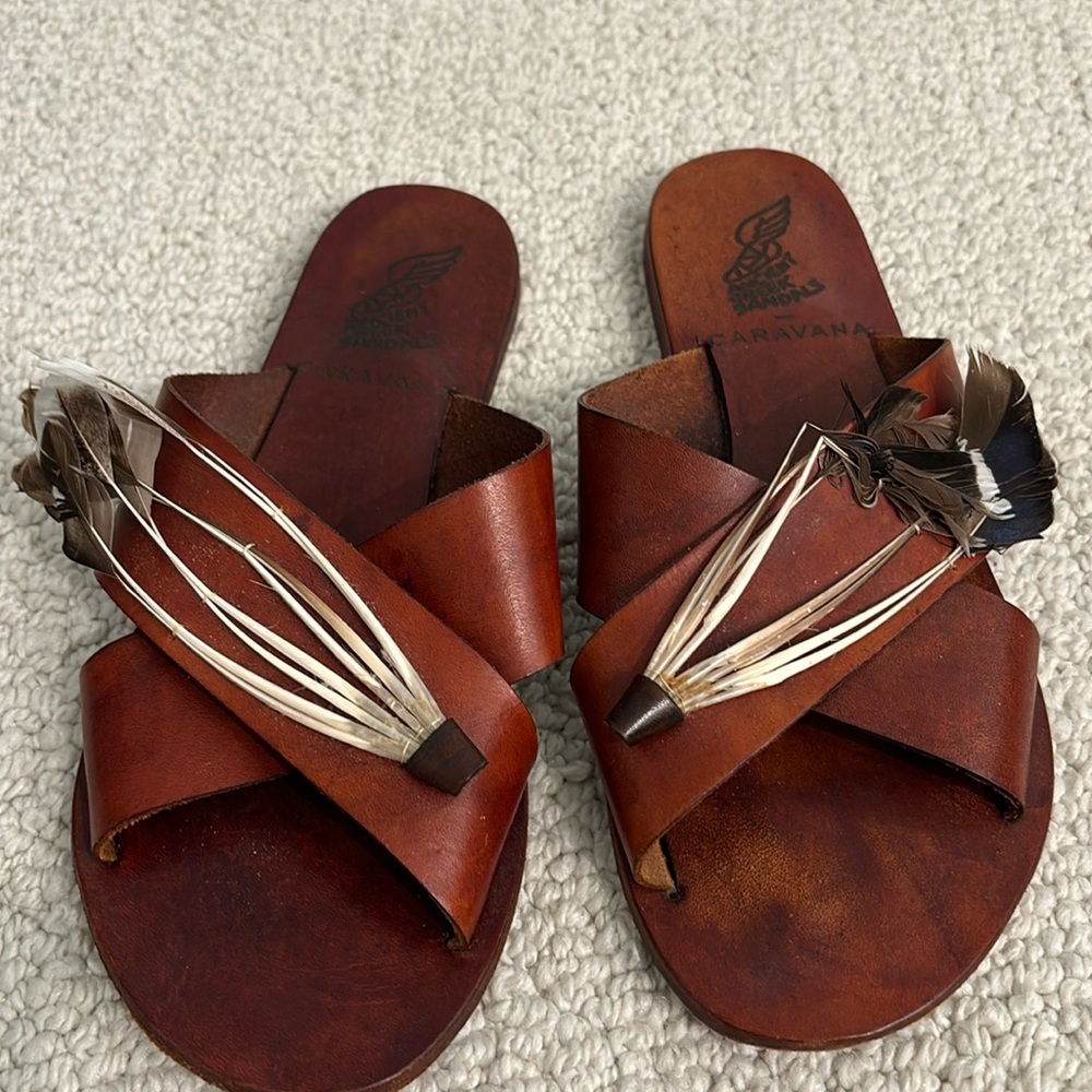 Ancient Greek sandals red with feathers